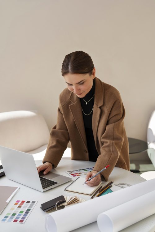 high-angle-woman-working-as-interior-designer